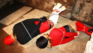www.joycealexander.net - Boots And Sweater Bondage: "Double Damsel Perils II" - Pic Set - Jan 18 thumbnail
